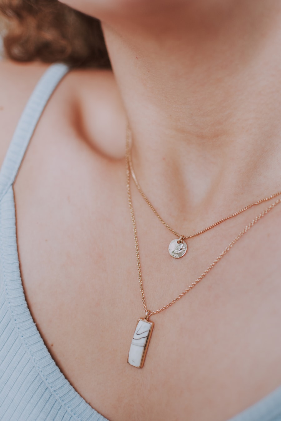 Elegant woman wearing gold jewelry